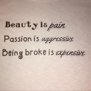 ‘Beauty is pain’ T-shirt